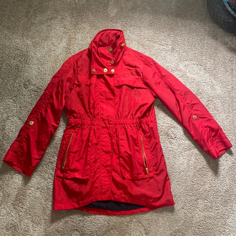 Red windbreaker jacket